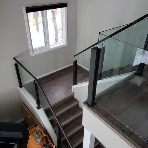 Topless glass railing with powder coated aluminum posts, 10mm glass, and 3" overhang
