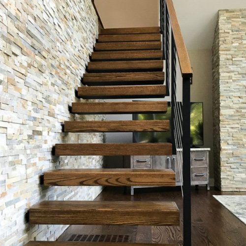 Cantilevered Stair With Wooden Tread Caps