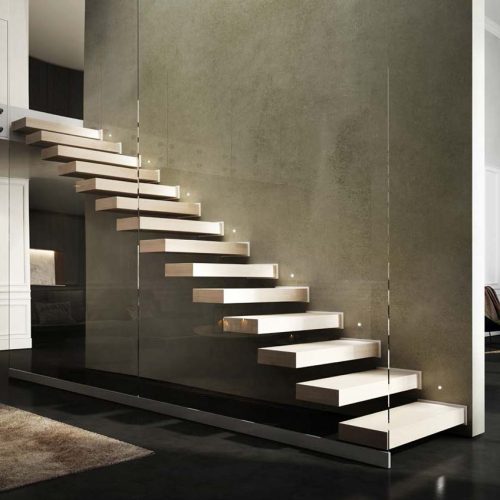 Cantilevered Stair With Wooden Tread Caps